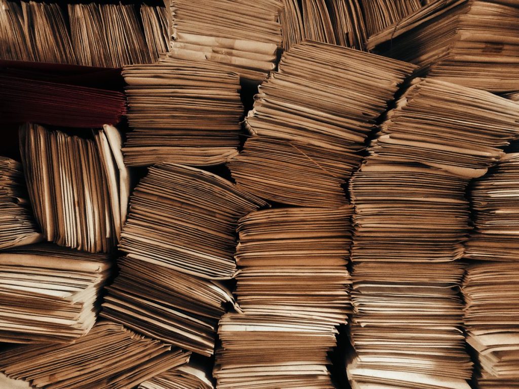 A detailed view of neatly stacked brown envelopes showcasing organization