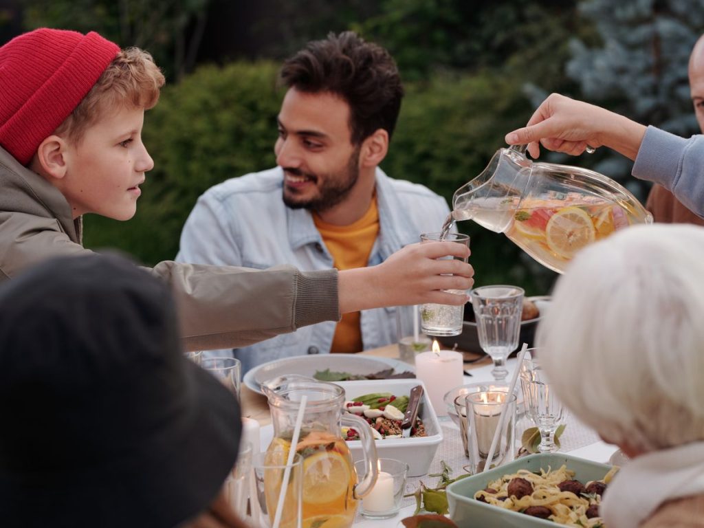 Multigenerational family sharing dinner together